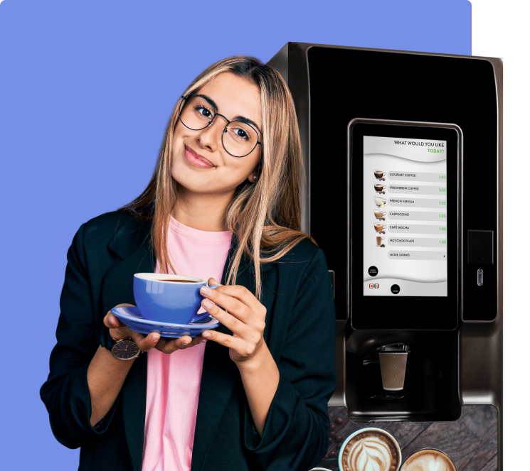 Woman holding coffee cup in front of vending machine